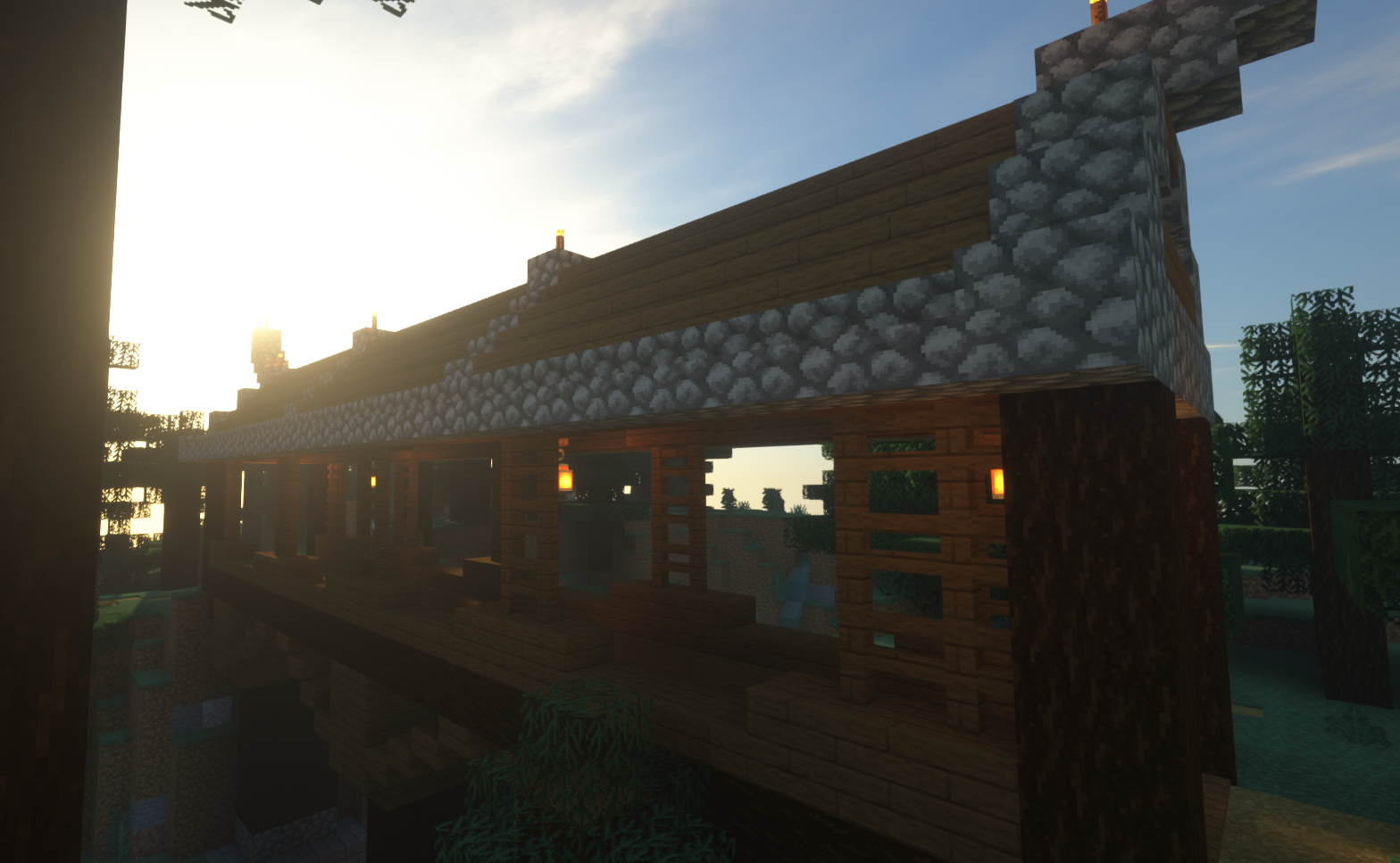 A Bridge with the sun rising behind it in MINECRAFT.